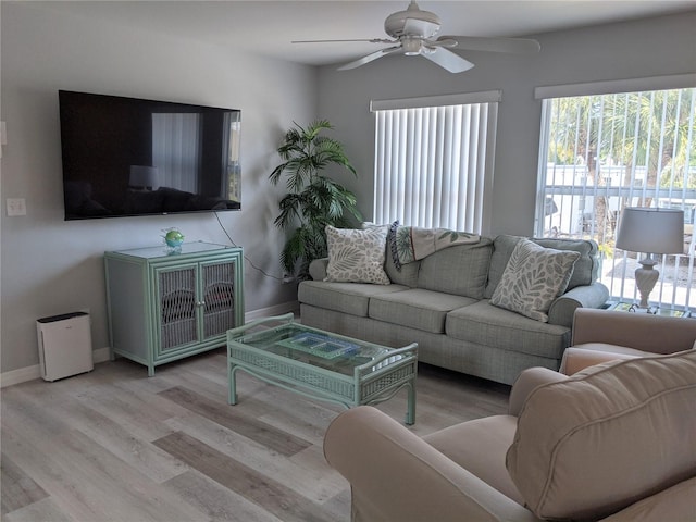 2373 N Beach Rd Unit 1C, Englewood, FL 34223 - living room with ceiling fan and wood finished floors