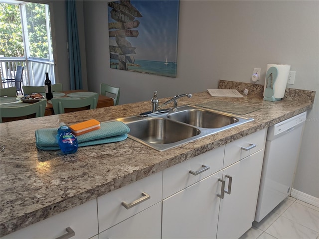 2373 N Beach Rd Unit 1C, Englewood, FL 34223 - kitchen with white dishwasher, white cabinetry, light marble finish floors, and light countertops
