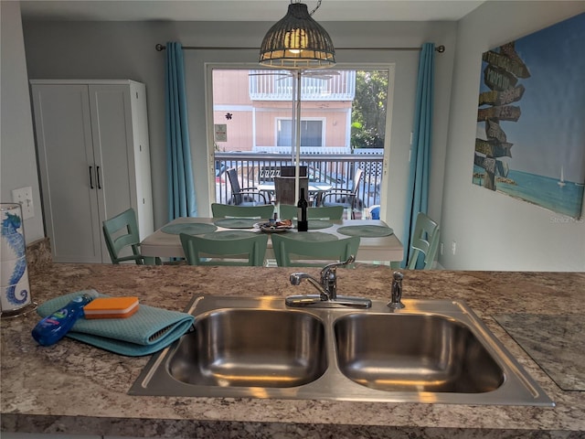 2373 N Beach Rd Unit 1C, Englewood, FL 34223 - kitchen featuring a sink and pendant lighting
