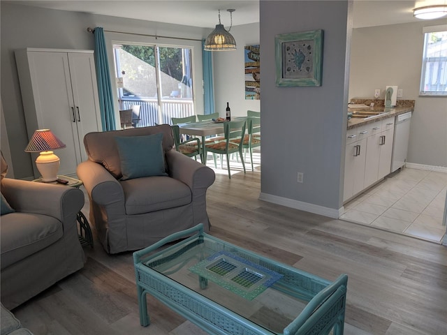 2373 N Beach Rd Unit 1C, Englewood, FL 34223 - living room featuring light wood-style flooring