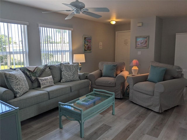 2373 N Beach Rd Unit 1C, Englewood, FL 34223 - living area featuring a ceiling fan and wood finished floors
