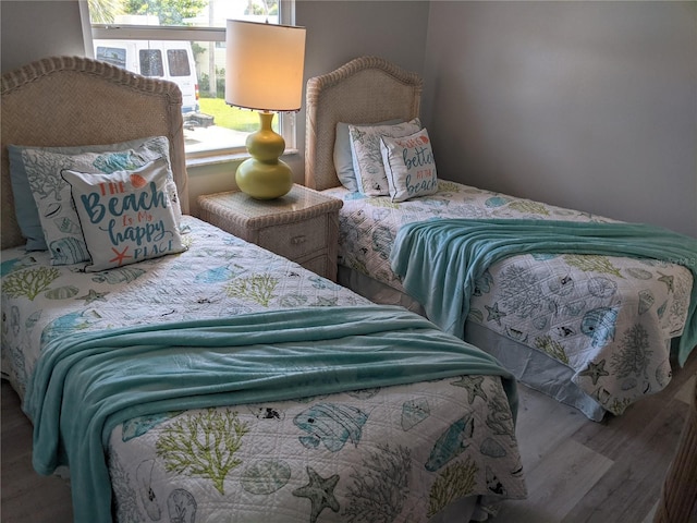2373 N Beach Rd Unit 1C, Englewood, FL 34223 - bedroom featuring wood finished floors