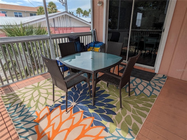 2373 N Beach Rd Unit 1C, Englewood, FL 34223 - wooden terrace with outdoor dining area