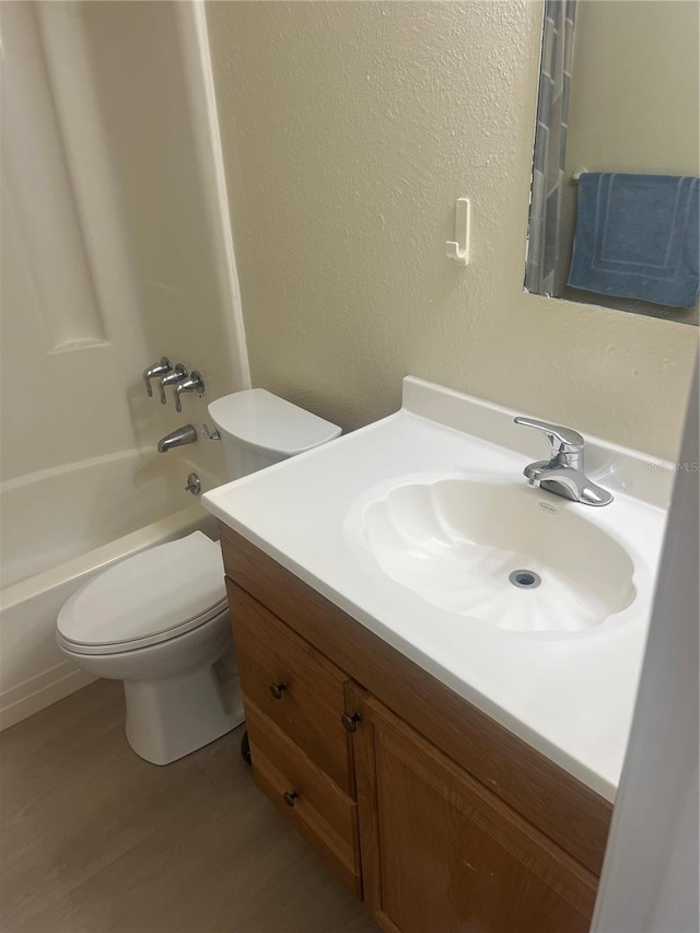 11216 Kimberly Ave Unit A & B, Englewood, FL 34224 - full bathroom featuring vanity, wood finished floors, and bathtub / shower combination