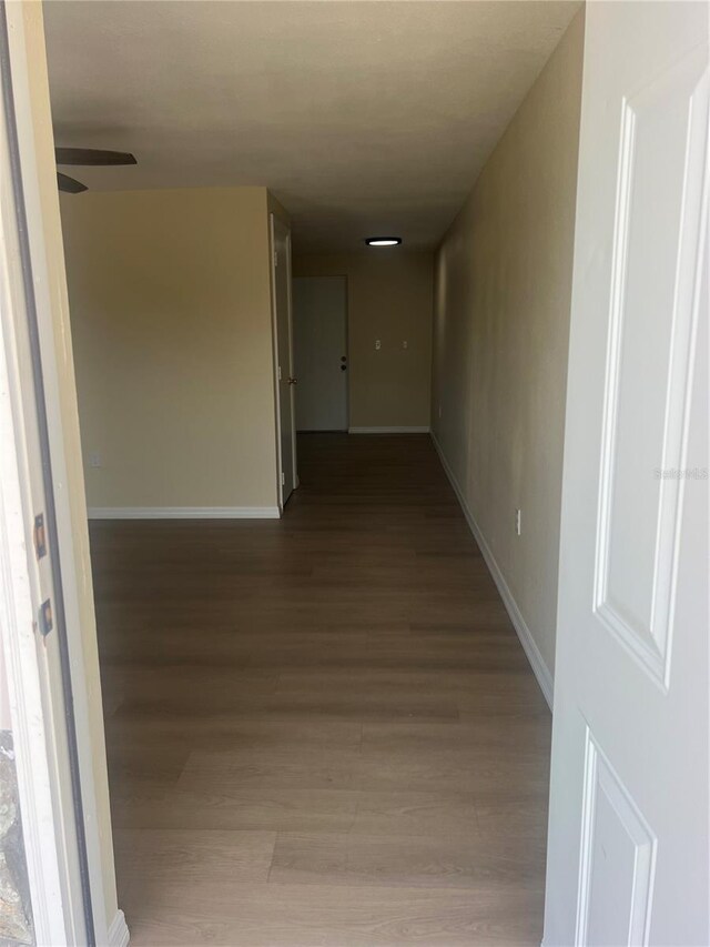 11216 Kimberly Ave Unit A & B, Englewood, FL 34224 - hall featuring wood finished floors and baseboards