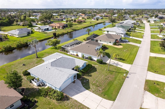 15 Bunker Pl, Rotonda West, FL 33947 - aerial perspective of suburban area with a large body of water