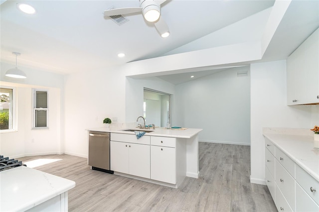 15 Bunker Pl, Rotonda West, FL 33947 - kitchen featuring stainless steel dishwasher, a ceiling fan, light wood-type flooring, light countertops, and lofted ceiling