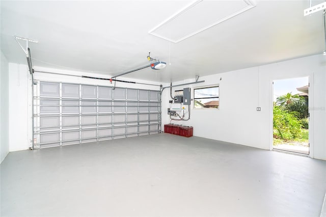 15 Bunker Pl, Rotonda West, FL 33947 - garage featuring a garage door opener and electric panel