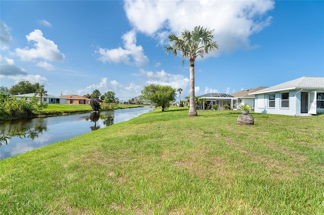 15 Bunker Pl, Rotonda West, FL 33947 - view of green lawn featuring a water view