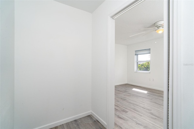 15 Bunker Pl, Rotonda West, FL 33947 - spare room featuring light wood-style flooring and ceiling fan