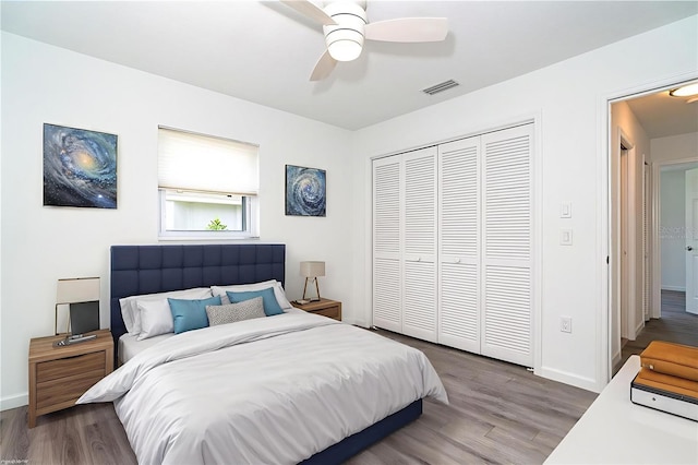15 Bunker Pl, Rotonda West, FL 33947 - bedroom featuring a closet, wood finished floors, and a ceiling fan