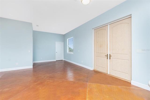 1930 Massachusetts Ave, Englewood, FL 34224 - unfurnished bedroom featuring finished concrete flooring and a closet
