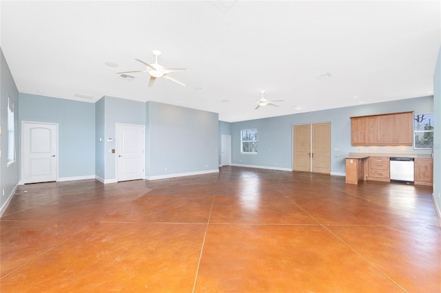 1930 Massachusetts Ave, Englewood, FL 34224 - unfurnished living room featuring finished concrete floors and ceiling fan
