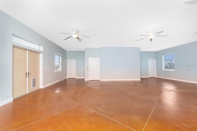 1930 Massachusetts Ave, Englewood, FL 34224 - unfurnished living room featuring ceiling fan and concrete floors