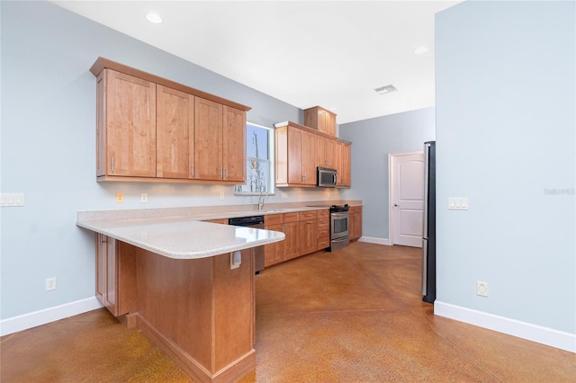 1930 Massachusetts Ave, Englewood, FL 34224 - kitchen featuring stainless steel appliances, a peninsula, light countertops, and a breakfast bar area