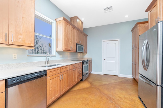 1930 Massachusetts Ave, Englewood, FL 34224 - kitchen with appliances with stainless steel finishes, light countertops, light carpet, recessed lighting, and light brown cabinets