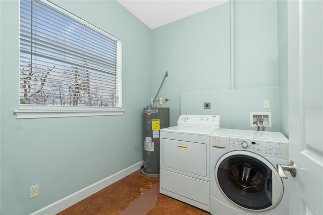 1930 Massachusetts Ave, Englewood, FL 34224 - laundry room with water heater and washing machine and dryer
