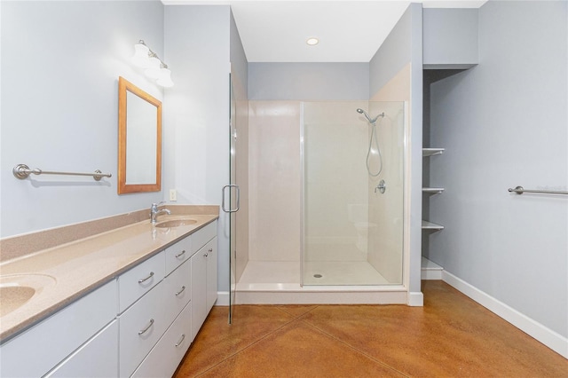 1930 Massachusetts Ave, Englewood, FL 34224 - bathroom with concrete flooring, double vanity, and a shower stall