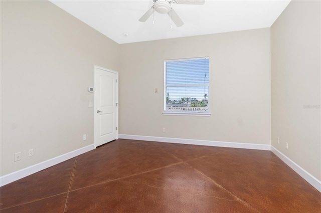 1930 Massachusetts Ave, Englewood, FL 34224 - empty room with finished concrete flooring and ceiling fan