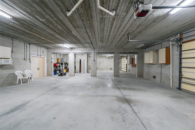 1930 Massachusetts Ave, Englewood, FL 34224 - garage featuring a garage door opener
