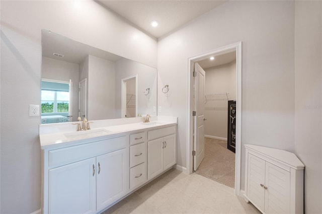 17921 Grand Prosperity Dr, Venice, FL 34293 - full bathroom with double vanity, a spacious closet, tile patterned floors, and recessed lighting