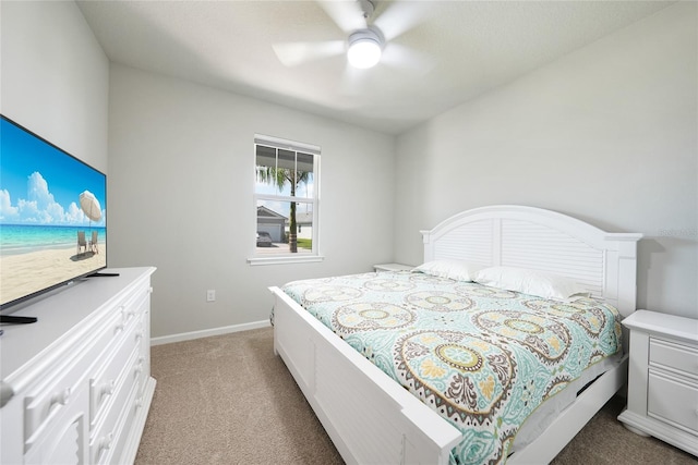17921 Grand Prosperity Dr, Venice, FL 34293 - bedroom with light colored carpet and ceiling fan