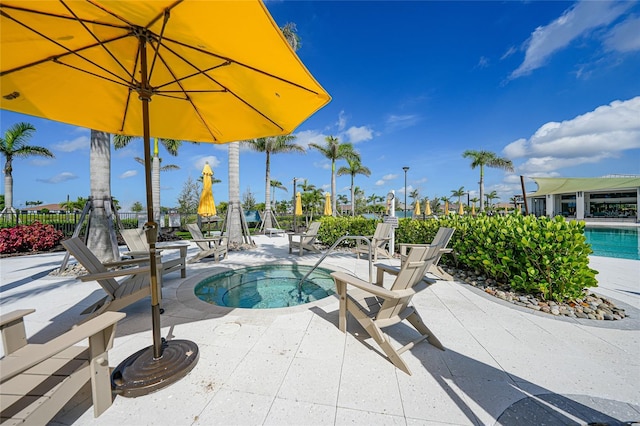 17921 Grand Prosperity Dr, Venice, FL 34293 - view of swimming pool featuring a swimming pool, a patio area, and a community hot tub