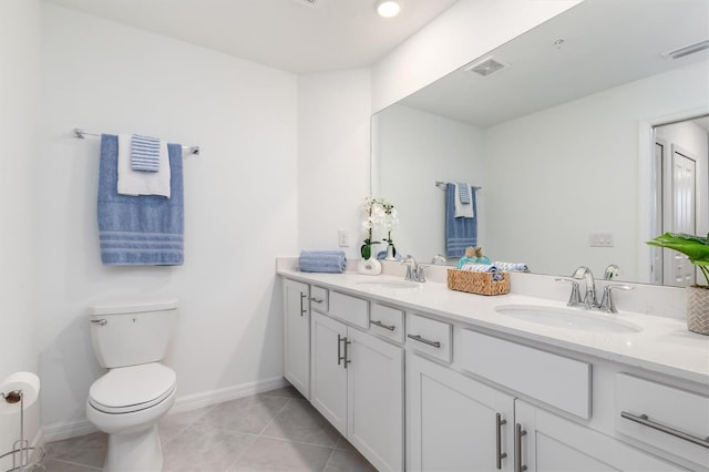 12550 Galapagos Ct Unit 104, Venice, FL 34293 - bathroom featuring double vanity and tile patterned floors