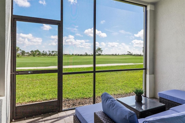12550 Galapagos Ct Unit 104, Venice, FL 34293 - sunroom / solarium featuring golf course view