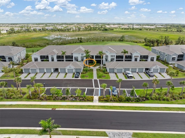 12550 Galapagos Ct Unit 104, Venice, FL 34293 - aerial view of residential area with a golf club and a nearby body of water