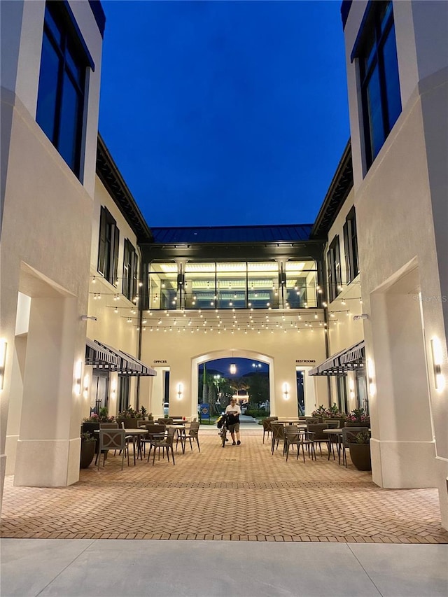 12550 Galapagos Ct Unit 104, Venice, FL 34293 - view of patio at night