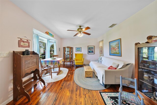 7690 Castleberry Ter, Englewood, FL 34224 - living area with wood finished floors and a ceiling fan