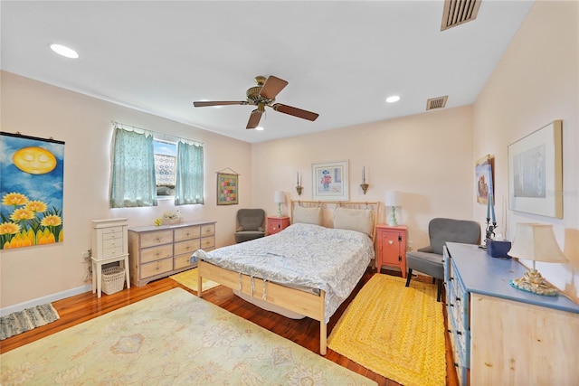 7690 Castleberry Ter, Englewood, FL 34224 - bedroom featuring wood finished floors, recessed lighting, and ceiling fan