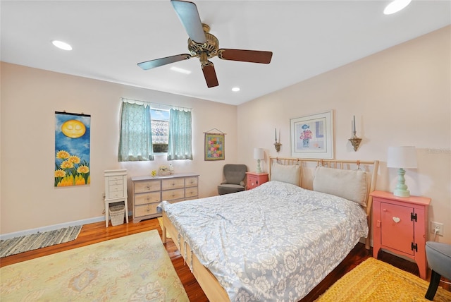 7690 Castleberry Ter, Englewood, FL 34224 - bedroom featuring wood finished floors, recessed lighting, and a ceiling fan