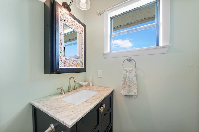 7690 Castleberry Ter, Englewood, FL 34224 - bathroom with plenty of natural light and vanity