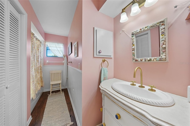 7690 Castleberry Ter, Englewood, FL 34224 - full bath with a closet, vanity, and wood finished floors