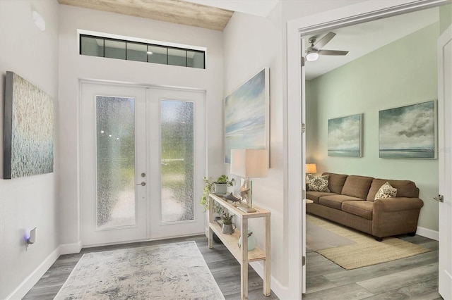 1269 N Lavina St, North Port, FL 34286 - foyer featuring french doors, plenty of natural light, and wood finished floors