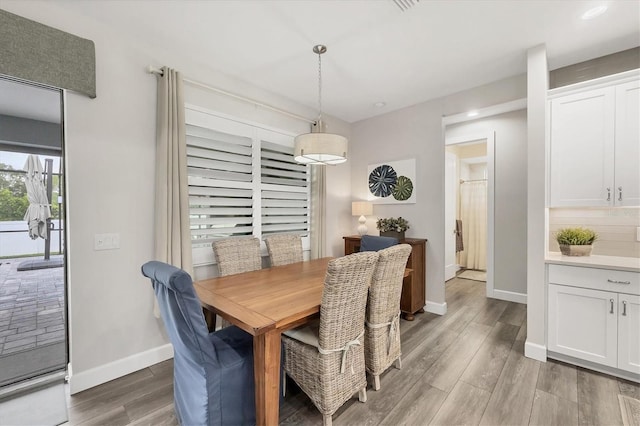 1269 N Lavina St, North Port, FL 34286 - dining area featuring light wood-style flooring and recessed lighting