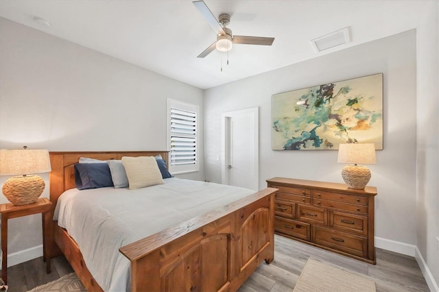 1269 N Lavina St, North Port, FL 34286 - bedroom with light wood-style flooring and ceiling fan