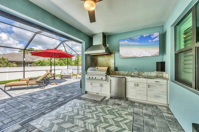 1269 N Lavina St, North Port, FL 34286 - view of patio with exterior kitchen and a lanai