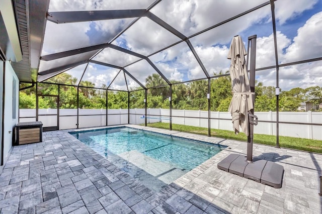 1269 N Lavina St, North Port, FL 34286 - view of pool featuring a patio, a fenced backyard, and glass enclosure