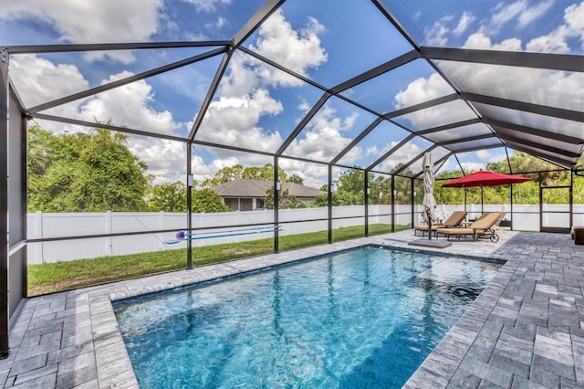 1269 N Lavina St, North Port, FL 34286 - view of pool featuring a patio, a fenced backyard, and glass enclosure