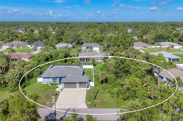 1269 N Lavina St, North Port, FL 34286 - aerial perspective of suburban area with a forest