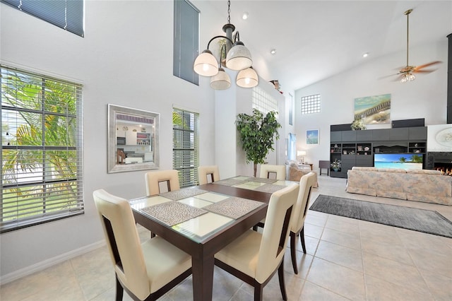 196 Lecturn St, Port Charlotte, FL 33954 - dining space with high vaulted ceiling, a chandelier, light tile patterned floors, and ceiling fan