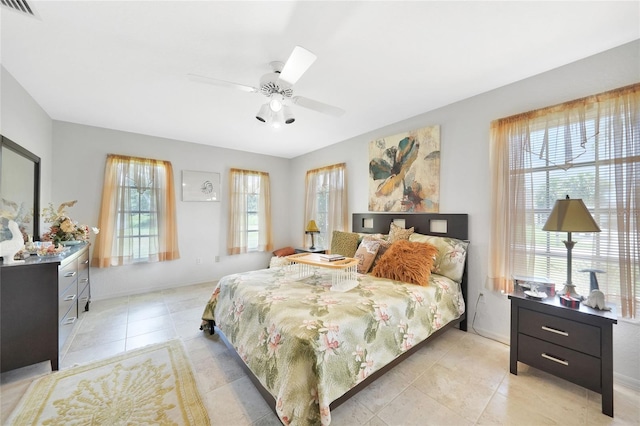 196 Lecturn St, Port Charlotte, FL 33954 - bedroom with light tile patterned floors and ceiling fan