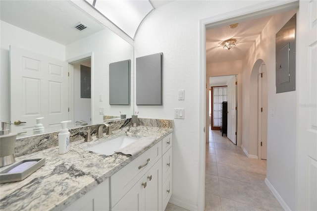 196 Lecturn St, Port Charlotte, FL 33954 - bathroom featuring vanity, tile patterned flooring, and electric panel