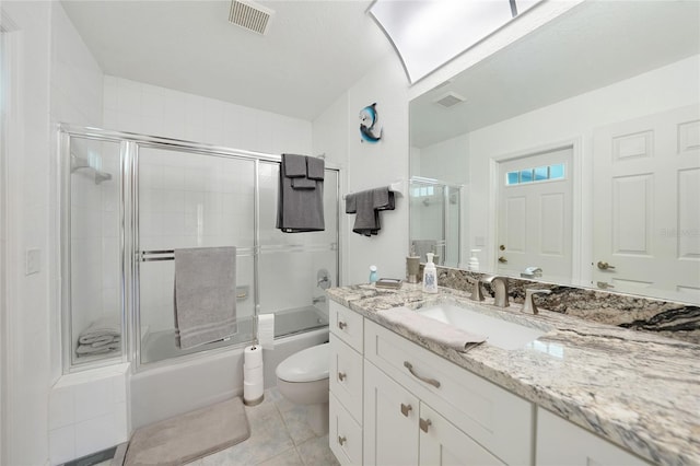 196 Lecturn St, Port Charlotte, FL 33954 - bathroom featuring vanity, combined bath / shower with glass door, and tile patterned flooring