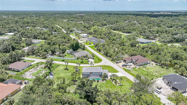 196 Lecturn St, Port Charlotte, FL 33954 - aerial perspective of suburban area with a forest