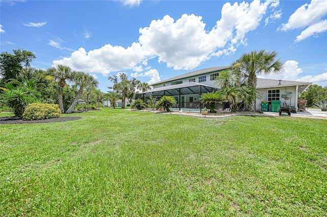 196 Lecturn St, Port Charlotte, FL 33954 - view of grassy yard with glass enclosure