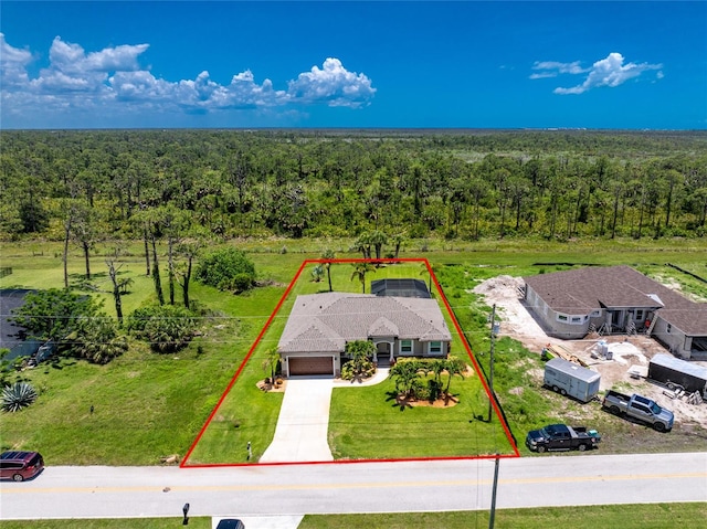 1119 Boundary Blvd, Rotonda West, FL 33947 - view from above of property featuring a heavily wooded area and property boundaries highlighted